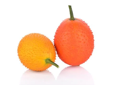 Gac fruit on white background Stock Photos