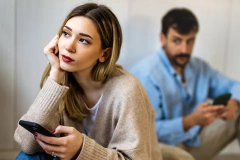 Gadget addiction and relationship problems. Couple with smartphones ignorin.. Stock-Fotos