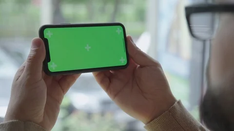 Gadget, screen with a green screen. A smartphone with a chromakey Stock Footage 93561483