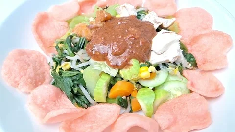 Gado-Gado Dish. Peanut Sauce Gado-Gado. Indonesian Salad Dish Stock Footage 317622731