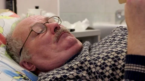 Gaffer old man read book Stock Footage 81836620