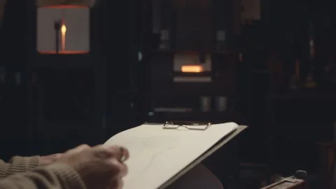 Gaffer Sketching in Glassblowing Workshop Stock Footage 255553122