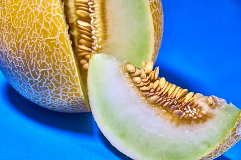Gaia melon slice on blue background 写真素材