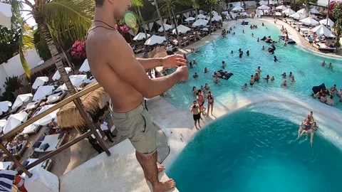 Gainer Back Flip Into Crowded Pool Club GoPro POV Stock Footage 144045904