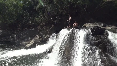 Gainer Back Flip Off Waterfall in Slow Motion Stock Footage 85130750