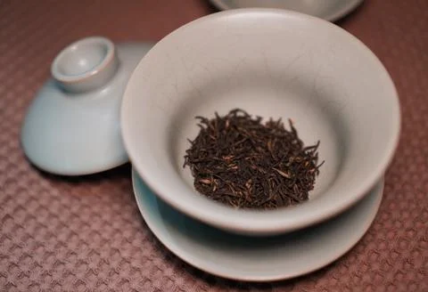 Gaiwan on the tea table selective focus. Gongfu cha tea ceremony. Stock Photos
