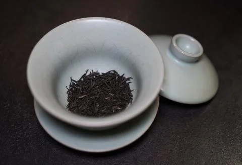 Gaiwan on the tea table selective focus. Gongfu cha tea ceremony. Stock Photos