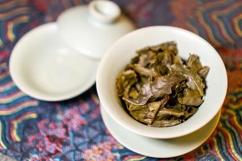 Gaiwan on the tea table selective focus. Gongfu cha tea ceremony. Stock Photos