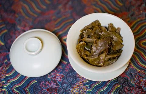 Gaiwan on the tea table selective focus. Gongfu cha tea ceremony. Stock Photos