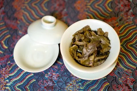 Gaiwan on the tea table selective focus. Gongfu cha tea ceremony. Stock Photos