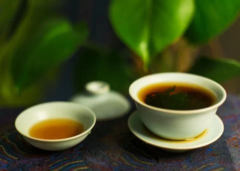 Gaiwan on the tea table selective focus. Gongfu cha tea ceremony. Stock Photos