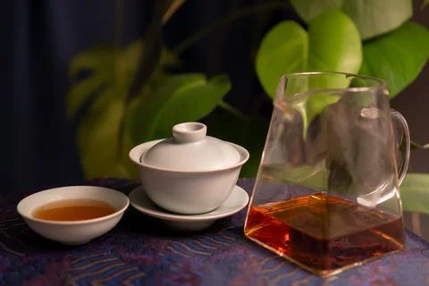 Gaiwan on the tea table selective focus. Gongfu cha tea ceremony. Stock Photos