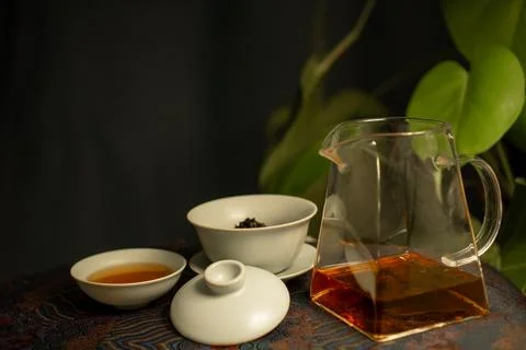 Gaiwan on the tea table selective focus. Gongfu cha tea ceremony. Stock Photos