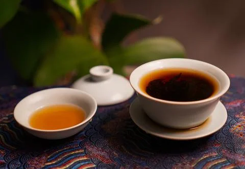 Gaiwan on the tea table selective focus. Gongfu cha tea ceremony. Stock Photos