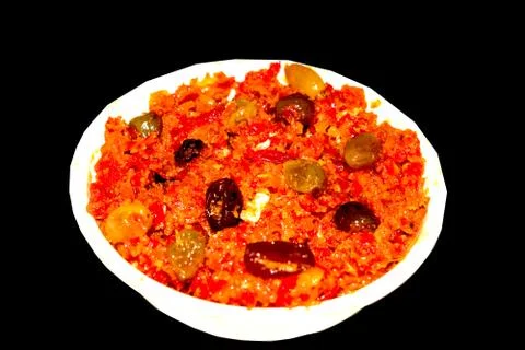 Gajar halwa is carrot based pudding made with khya,milk,almond,pistachio. Stock Photos