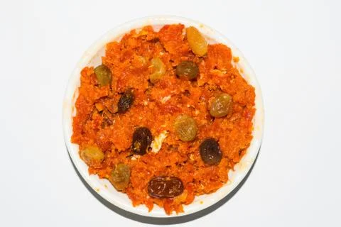 Gajar halwa is carrot based pudding made with khya,milk,almond,pistachio. Stock Photos