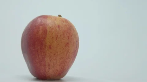 Gala Apple. One apple that’s  rotations. Stock Footage 119050718