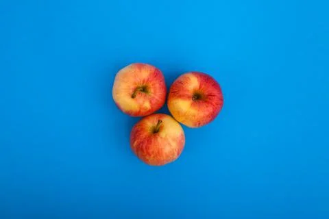 Gala apples on a blue backdrop Stock Photos