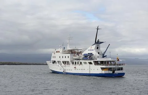 Galapagos cruise ship Eclipse anchored off Baltra Island Stock Photos