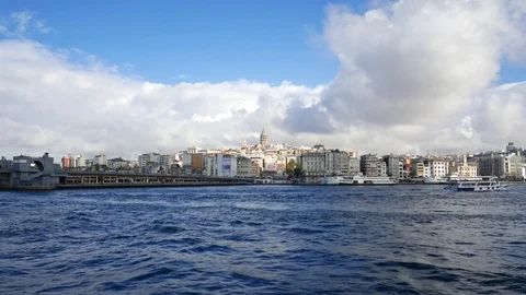 Galata tower (centre) viewed from moving ferry in Istanbul, Turkey. Видео 95876268