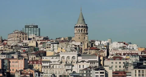 The Galata tower rises between the buildings. Stock Footage 247654894