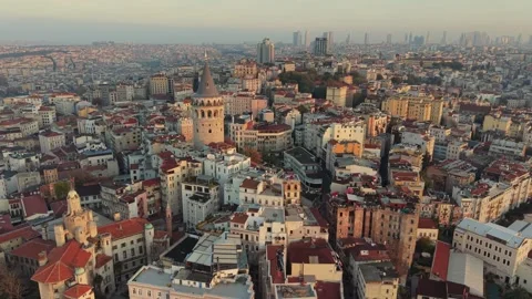 Galata Tower rising above ancient rooftops of Istanbul, Turkey Stock Footage 341750740