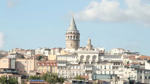 Galata tower, seagulls pass in front of galata tower, hand shot Stock Footage 162606182