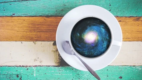 Galaxy in coffee cup 4k Stock Footage 75427395