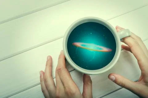 Galaxy in the cup Stock Photos