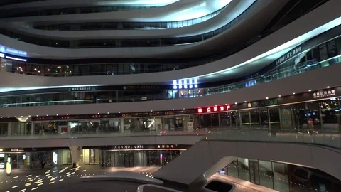 Galaxy SOHO Zaha Hadid Architect. Modern architecture  Beijing China. Night 4K.  Stock Footage