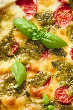 Galette-type pie made from puff pastry and filled with tomatoes, mozzarella.. Stock Photos