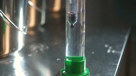 Galileo thermometer displays temperature changes based on the physics of density Stock Footage 201112865