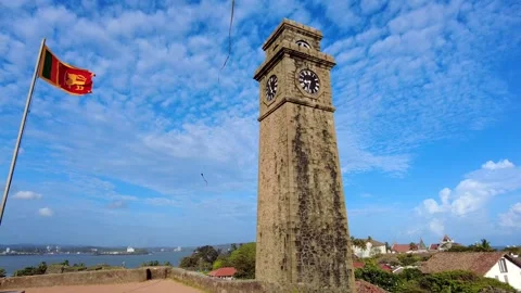 The Galle Clock Tower (or Anthonisz Memorial Clock Tower) and kites above Stock Footage 315120314