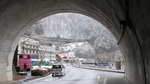 Gallery exit with japanese car Stock Footage 104372643