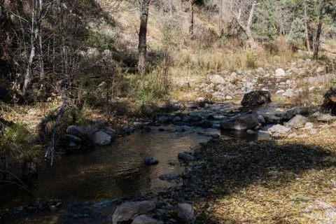 Gallinas Creek flows in New Mexico. Stock Photos