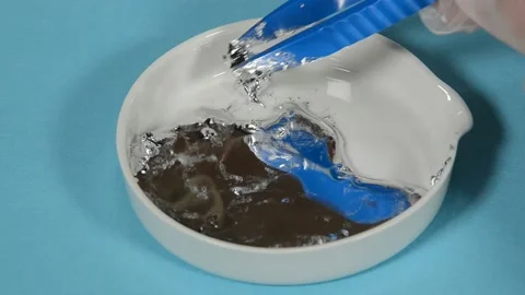Gallium in liquid form, crystals can be picked from the bottom of the melt Stock Footage 134668059