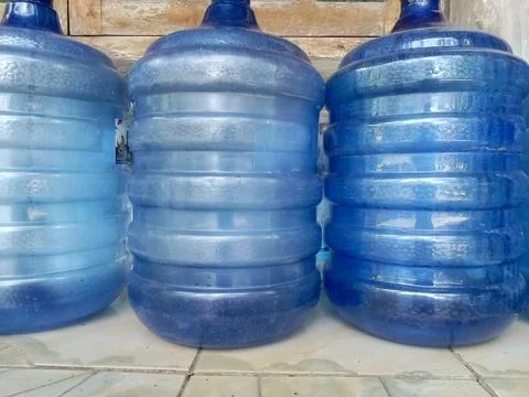 Gallon plastic drinking water container. Фото
