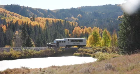 Galloping Goose Drive By Pond Stock Footage 309430663