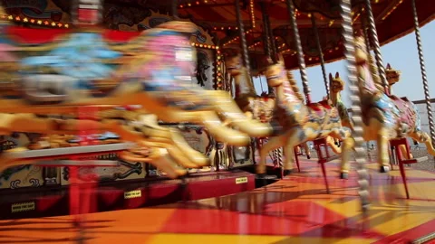 Galloping horse carousel fairground ride Brighton beach Sussex UK Stock Footage 157146044