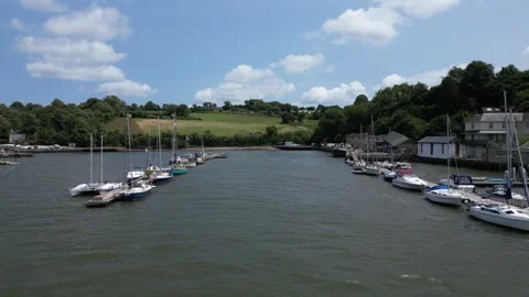Galmpton Creek, Devon, England: DRONE VIEWS: The Creek and Moored Yachts / Boats Stock Footage 244718068