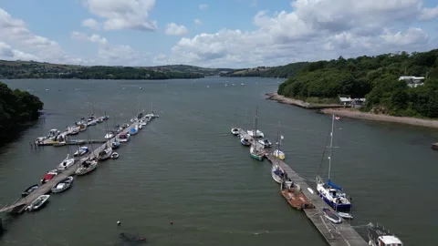 Galmpton Creek, Devon, England: DRONE VIEWS: The Creek, boats and the River Dart Stock Footage 244718198