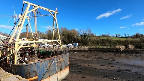Galmpton Creek, Devon: Trawler, creek and passing clouds (TIMELAPSE, NO AUDIO) Stock Footage 125454409