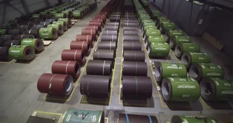 Galvanized metal sheet in large rolls is stored in a warehouse for the Stock-Footage 206788675