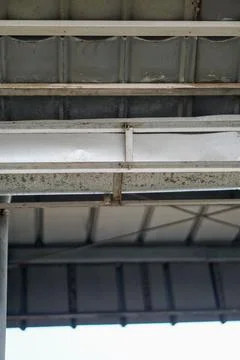 Galvanized rain gutter installation and electrical wiring beneath Fotos de archivo