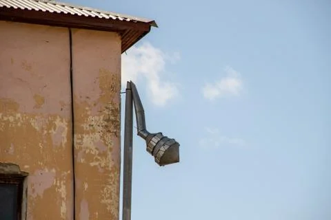 Galvanized Rain Gutter, Rainwater Pipe and Connector Nozzle at tiled Roof Stock Photos