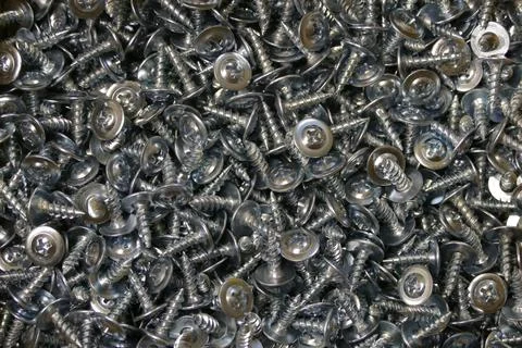 Galvanized self-cutters sharp with press puck under the crucipte Stock Photos