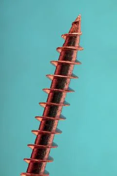 Galvanized self-tapping screw close-up in a creative color Stock Photos
