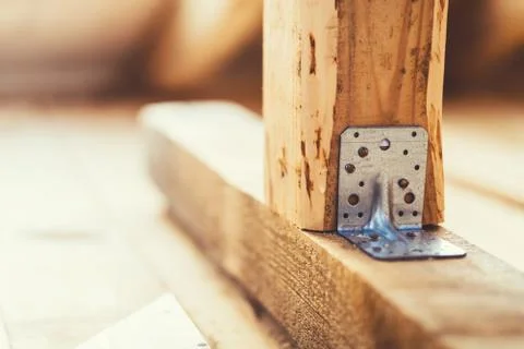 Galvanized steel rectangular fixing plate used for construction timber beams  Stock Photos