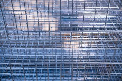 Galvanized steel wire mesh grid background for construction and industry Stock Photos