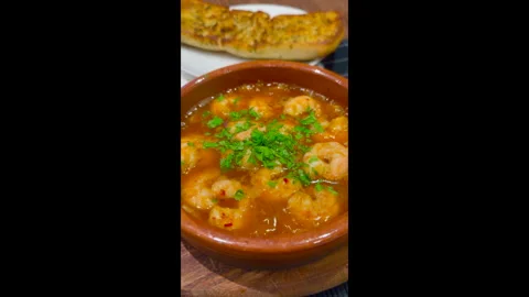 Gambas Pil Pil also know as Gabas Al Ajillo Stock Footage 279986895
